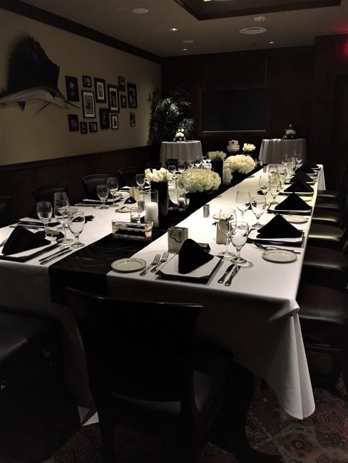 picture of Dallas private dining room decorated with white tulips and white hydrangea