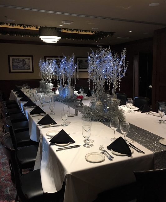 picture of Dallas private dining room decorated with silver holiday decorations