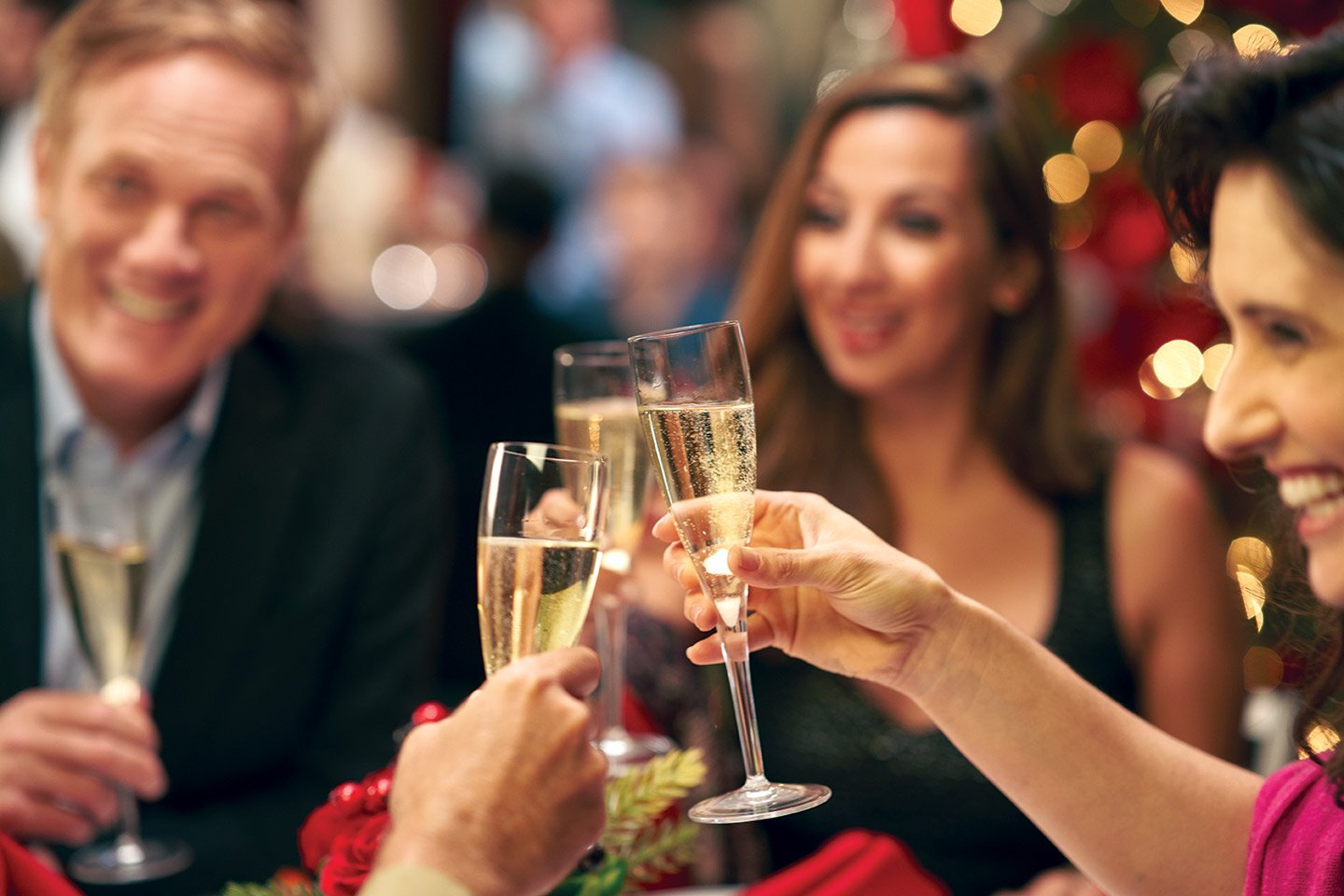 picture of Friends toasting champagne at a party