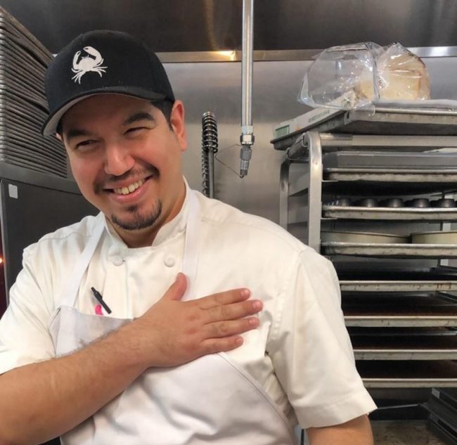 picture of Chef Michael Cerny with his hand on his heart